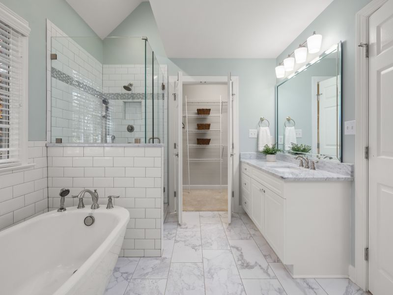A bright, freshly renovated bathroom finished by Tidewell